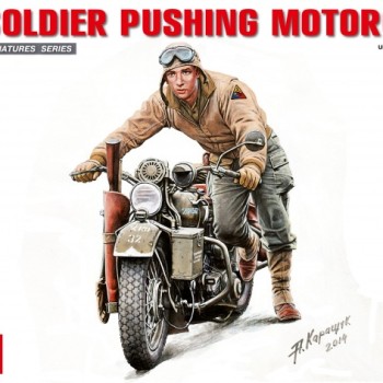 U.S.SOLDIER PUSHING MOTORCYCLE